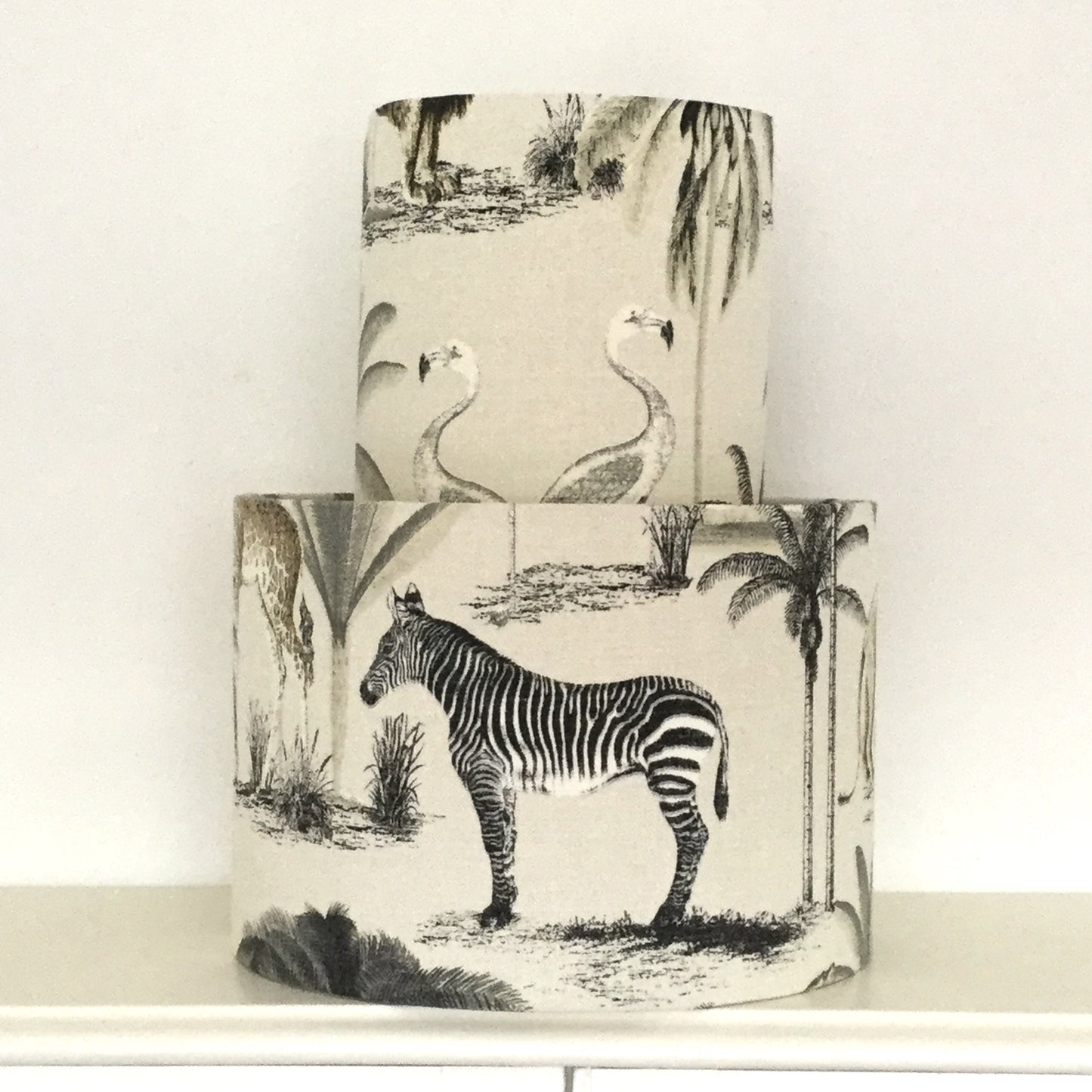 African safari-themed lampshade with vibrant animal and landscape motifs, perfect for adding a touch of exotic style and warmth to home decor.