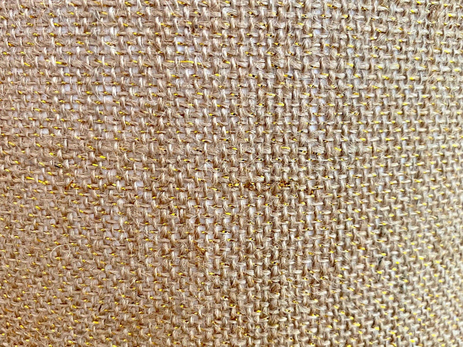Natural hessian lampshade with a textured weave, offering a rustic and earthy aesthetic, perfect for adding warmth to any room.