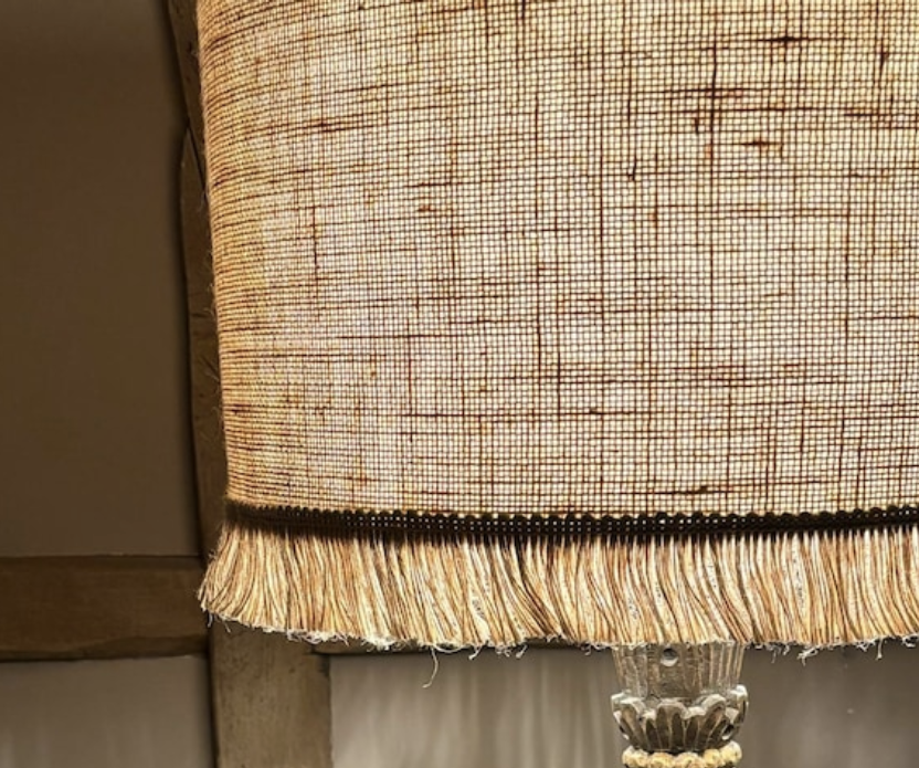 Natural hessian lampshade with a textured weave, offering a rustic and earthy aesthetic, perfect for adding warmth to any room.