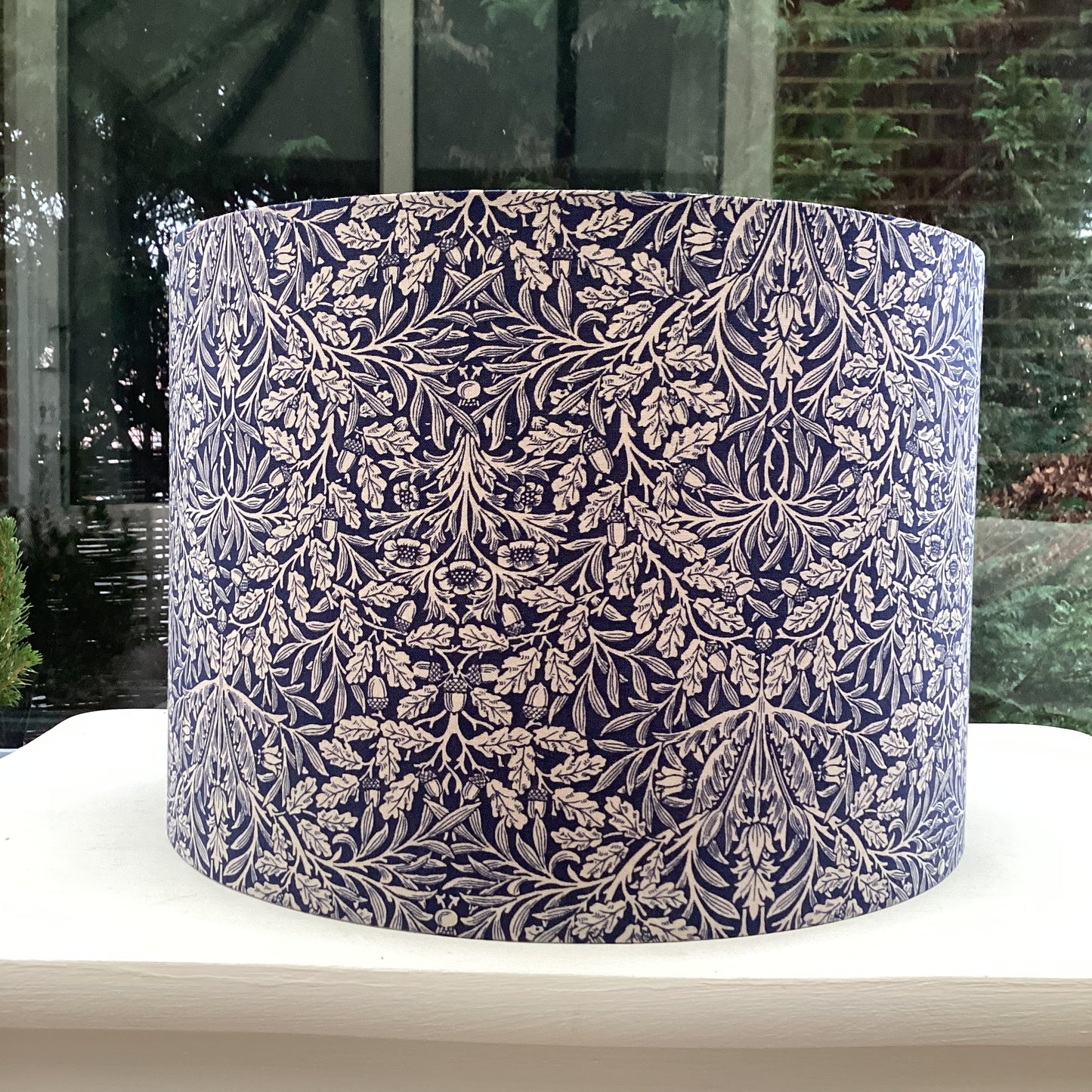 William Morris Pure Acorn Navy lampshade featuring a classic floral and acorn pattern in rich navy blue tones, ideal for traditional and vintage-inspired home decor.
