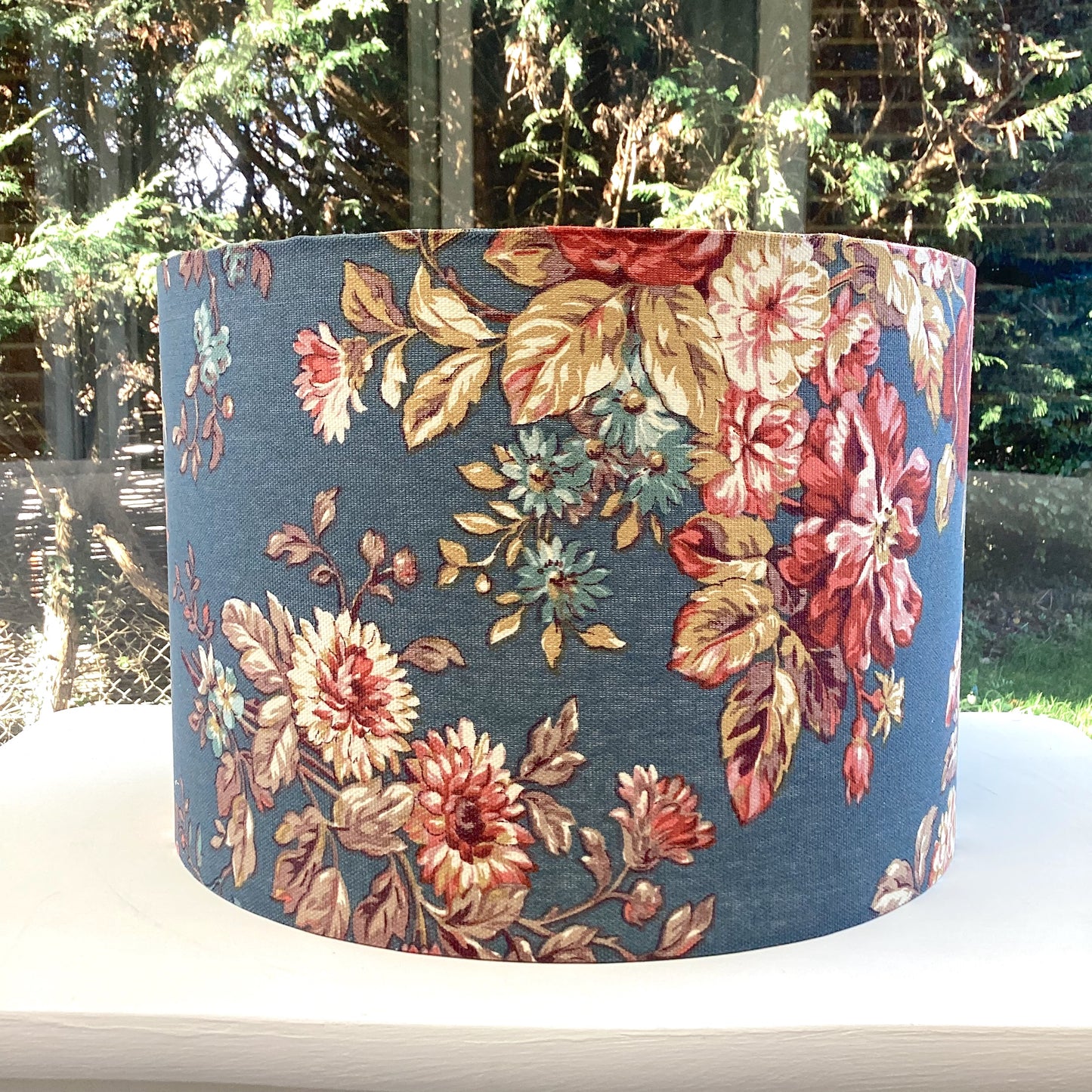 Autumn Bloom Ralph Lauren lampshade with vibrant floral design, featuring rich autumnal colors and intricate details, perfect for enhancing home decor and adding a touch of elegance to any room.