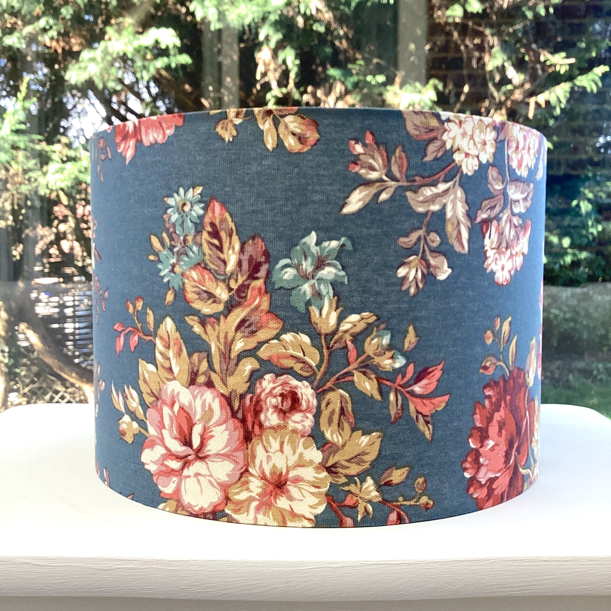 Autumn Bloom Ralph Lauren lampshade with vibrant floral design, featuring rich autumnal colors and intricate details, perfect for enhancing home decor and adding a touch of elegance to any room.