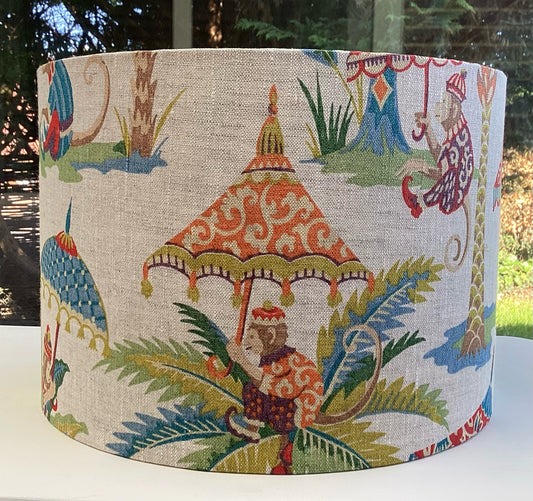 A playful lampshade featuring a cheerful monkey motif, perfect for adding whimsy to any space.