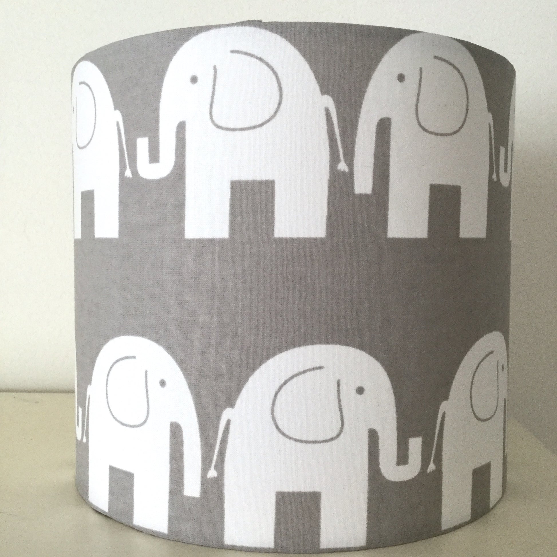 Modern grey lampshade with a elephant motif, adding contemporary flair to any space.