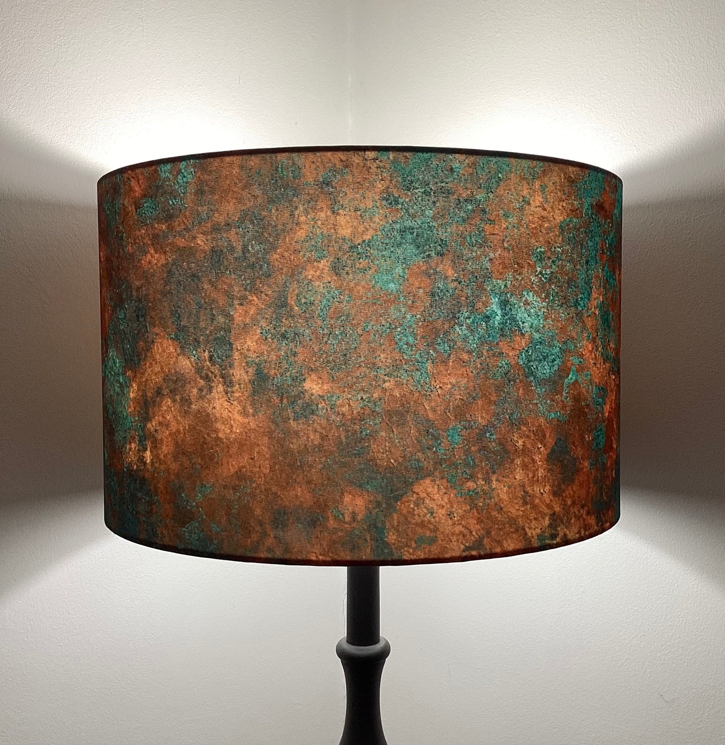 Rustic rusted metal lampshade with an industrial design, perfect for vintage and farmhouse-inspired interiors. Durable and stylish lighting accessory for modern homes.