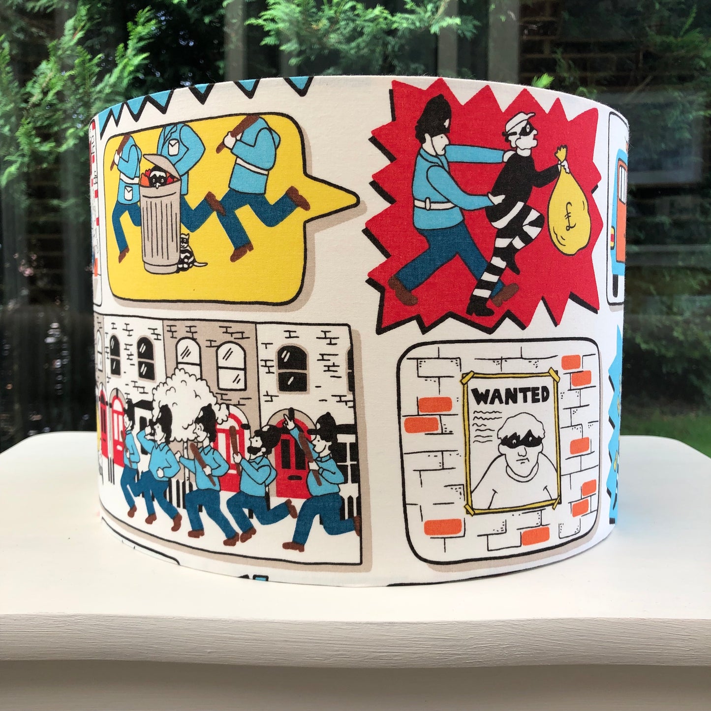 Vintage-inspired 'Stop Thief Cops and Robbers' kids' game design, featuring playful graphics of police and robbers in action. Perfect for nostalgic collectors and children's decor.