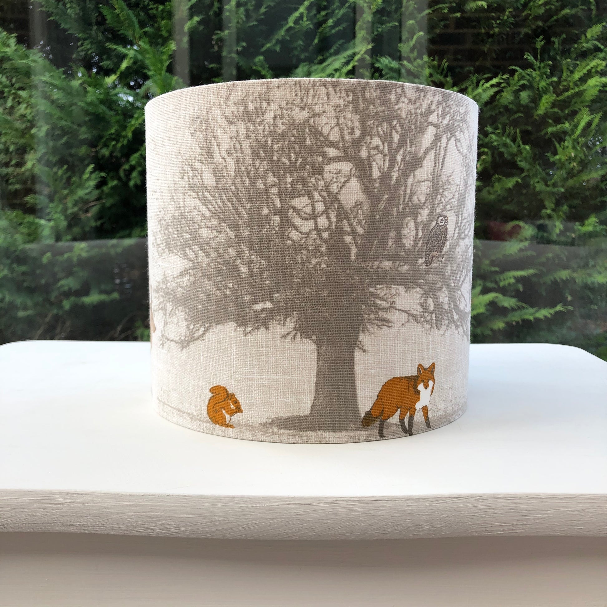 Handcrafted Tatton Woodland Wildlife lampshade featuring a detailed nature-inspired design with woodland animals, perfect for rustic and nature-themed decor.