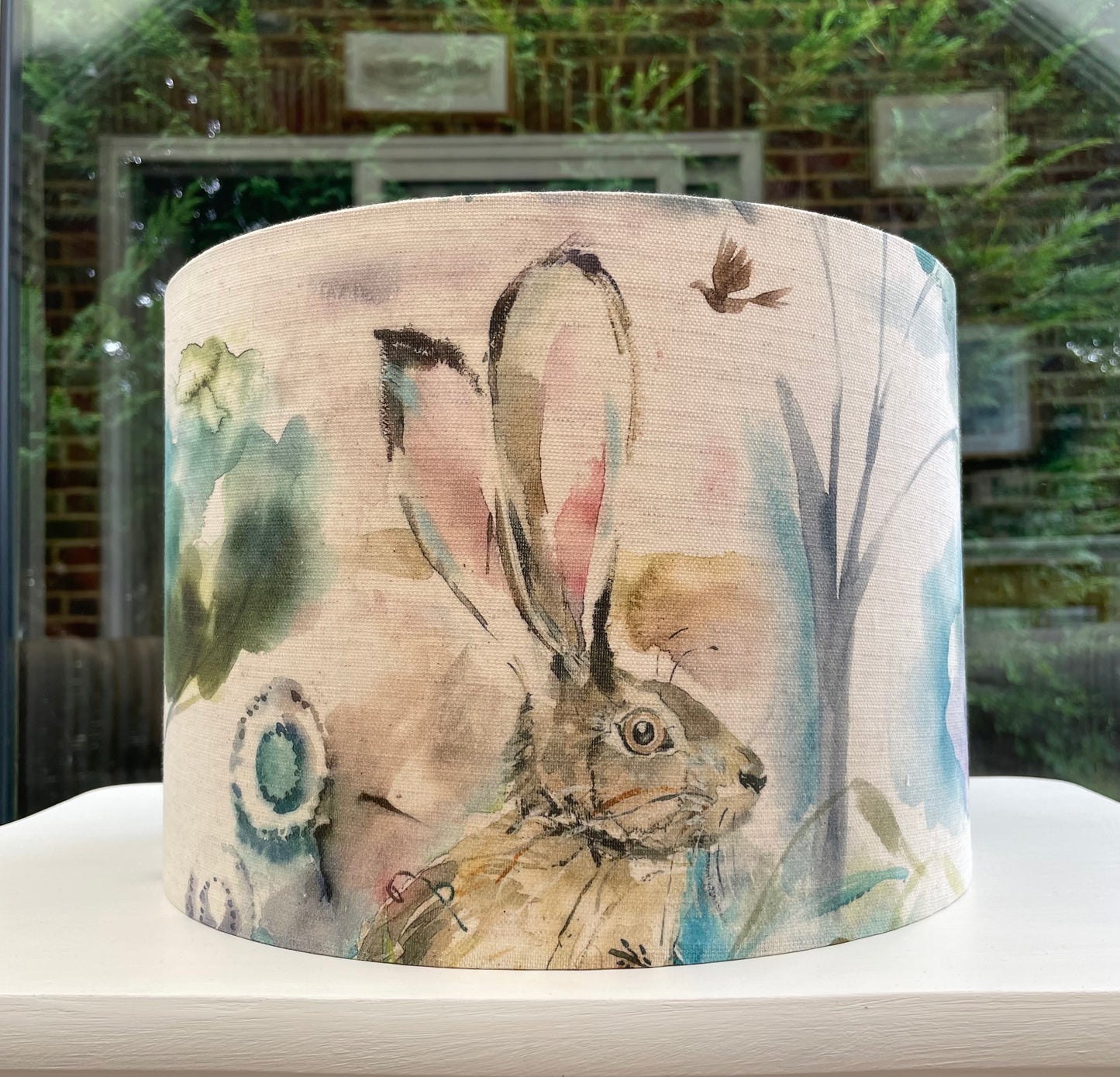 Handcrafted lampshade with Voyage Maison Grassmere Jack Rabbit design, featuring charming rabbit illustrations and nature-inspired patterns, perfect for rustic and modern decor.