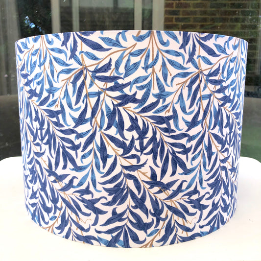 Blue lampshade featuring a delicate willow bough pattern, offering a serene and nature-inspired ambiance.