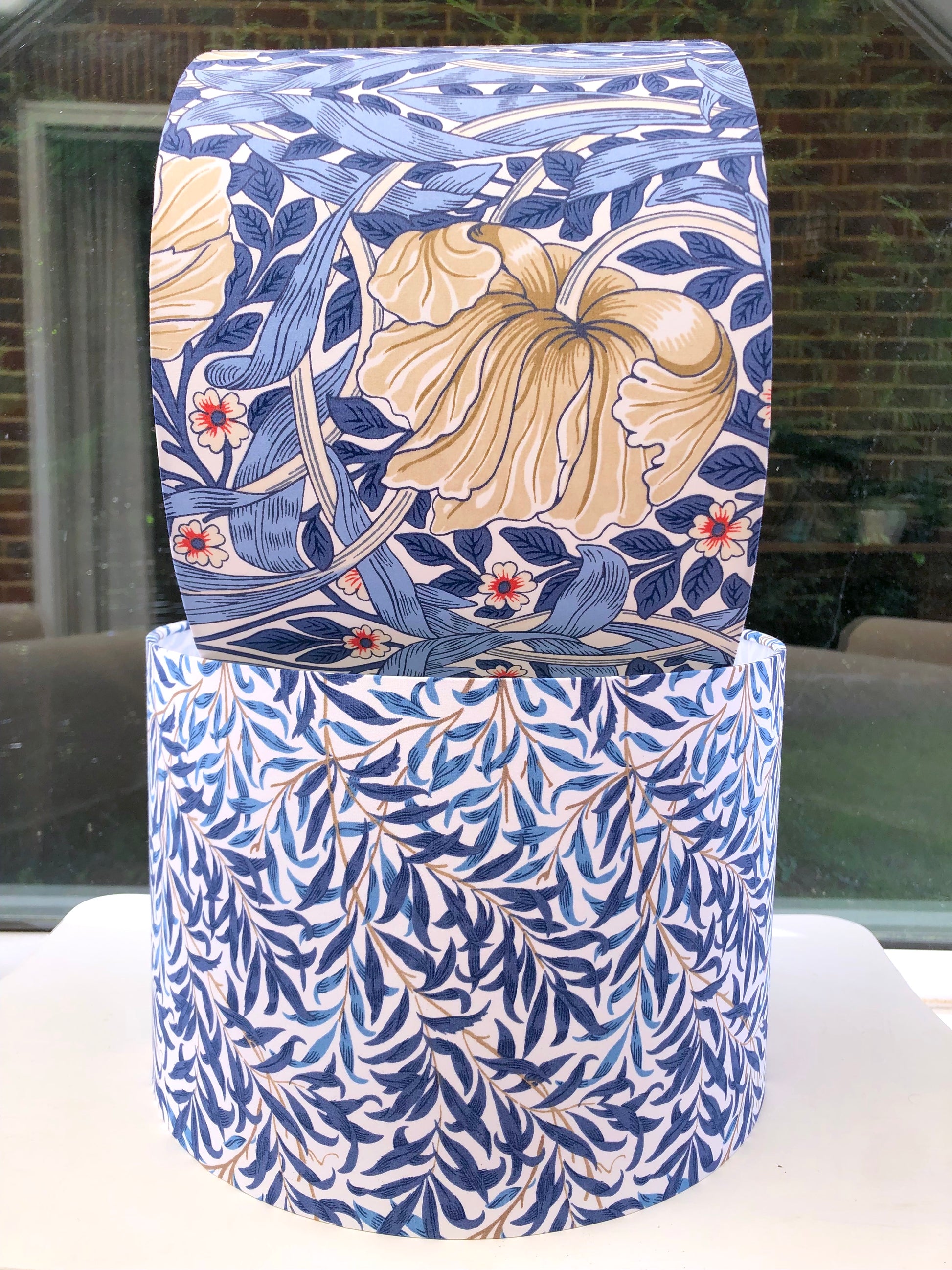 Blue floral-patterned lampshade, bringing a touch of nature-inspired charm to any space.