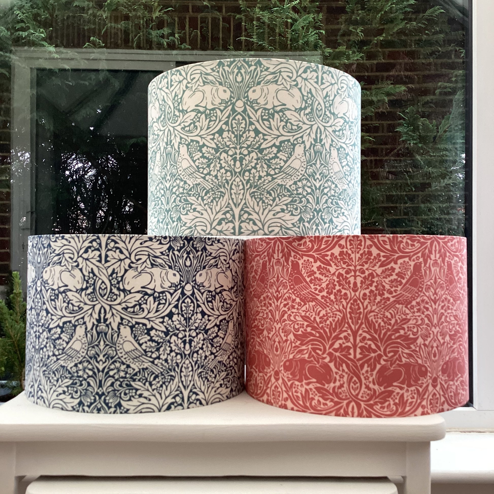 William Morris Brer Rabbit lampshade in navy blue with detailed floral and animal motifs, perfect for adding a vintage, artistic touch to any room.