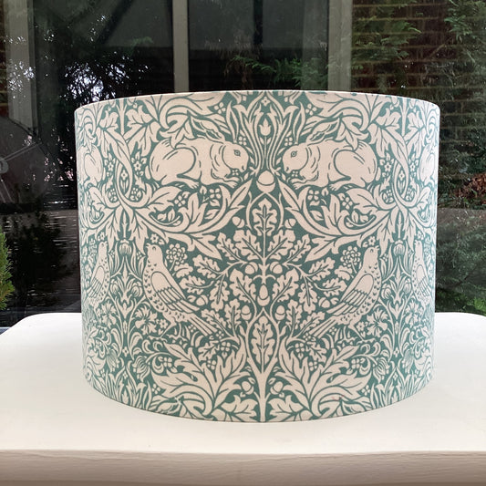 William Morris Brer Rabbit Duckegg lampshade with detailed floral pattern, soft duck egg blue background, perfect for adding vintage-inspired elegance to any room decor.