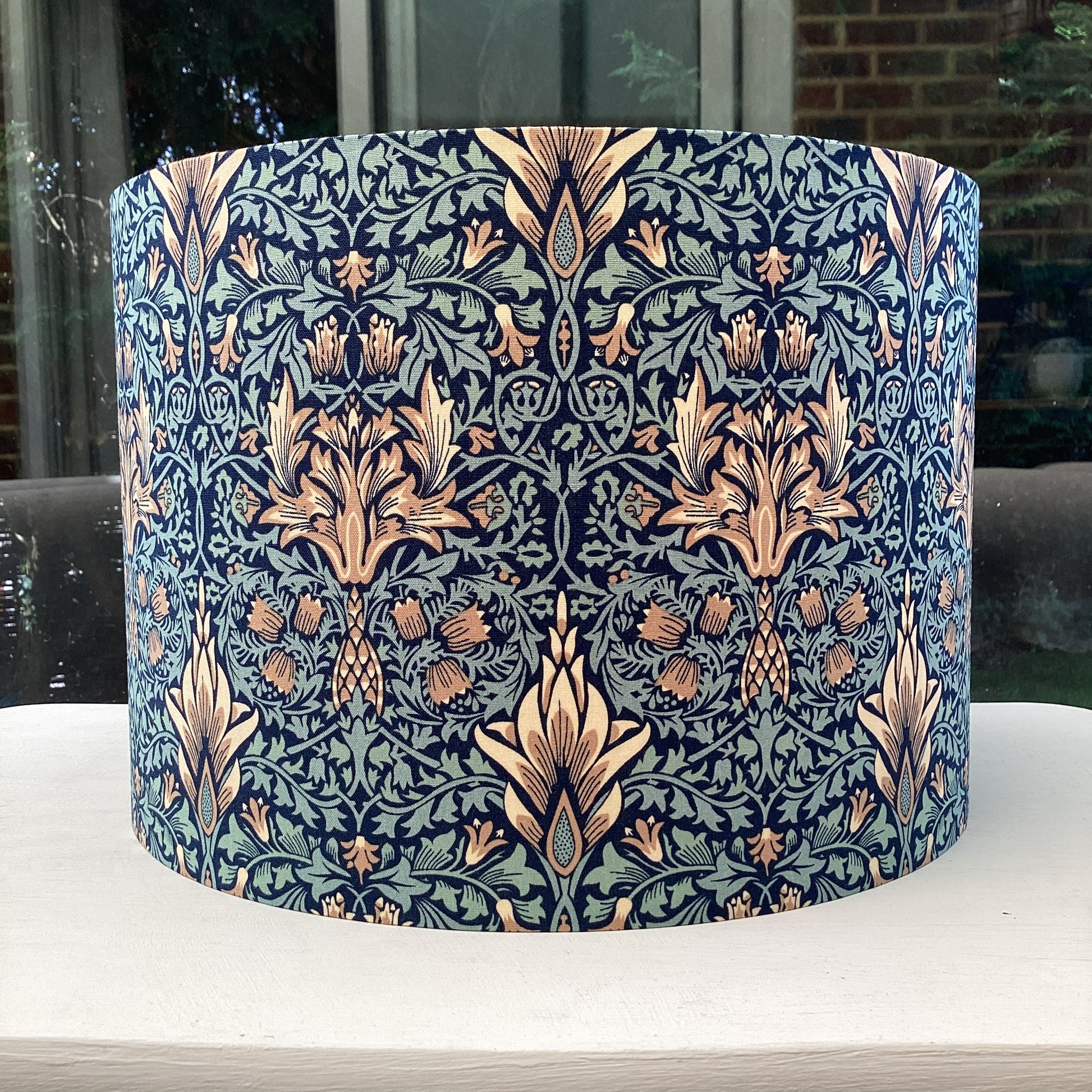 William Morris Snakeshead floral lampshade in rich earthy tones, perfect for adding a touch of vintage charm and elegance to your home decor.