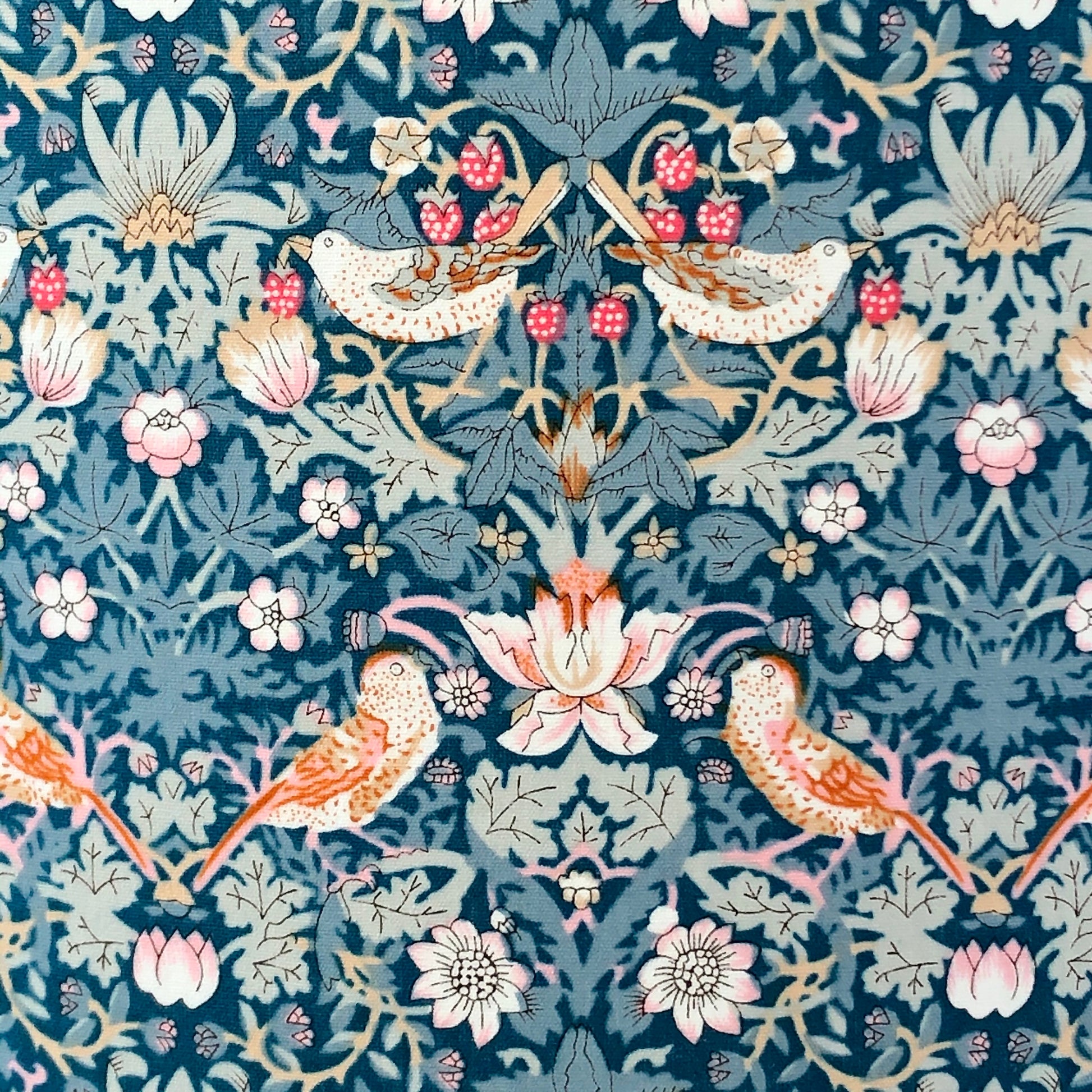 William Morris Strawberry Thief lampshade in green, blue, and pink, showcasing a vintage floral design. Perfect for adding a touch of classic elegance to any room decor.